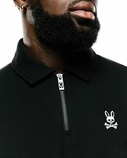 Men's Samson Quarter-Zip Sweater in black smooth jersey knit, featuring a collared neck, silver quarter-zip with a Psycho Bunny logo pull, and a small white embroidered bunny skull logo on the left chest. (3)
