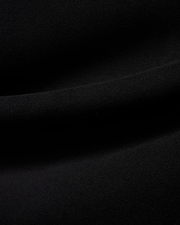 Men's Samson Quarter-Zip Sweater in classic black, crafted from a soft, smooth jersey knit fabric, showcasing its premium texture with subtle folds. (6)