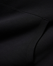 Mens Nathaniel Relaxed Chest Hoodie in deep black, crafted from a soft knit fabric with a subtle diagonal texture and a prominent ribbed cuff detail. (6)