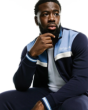 Men's Jacques Pique Track Jacket in navy with light blue and white color-blocked panels, featuring a full zip, ribbed cuffs with stripes, and an embroidered white Psycho Bunny script logo on the left chest. (4)