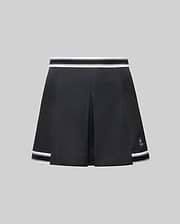 The WOMENS KNIT SKORT - WO1900001 by Psycho Bunny is a black pleated mini skort with white striped trim at the waistband and hem, plus a small white Psycho Bunny logo near the left hem, shown on a plain gray background. (6)