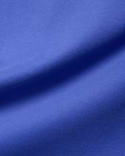 Women's Clara Pique Dress in a rich, vibrant royal blue, showcasing the signature textured pique fabric, embodying Psycho Bunny's premium streetwear aesthetic.