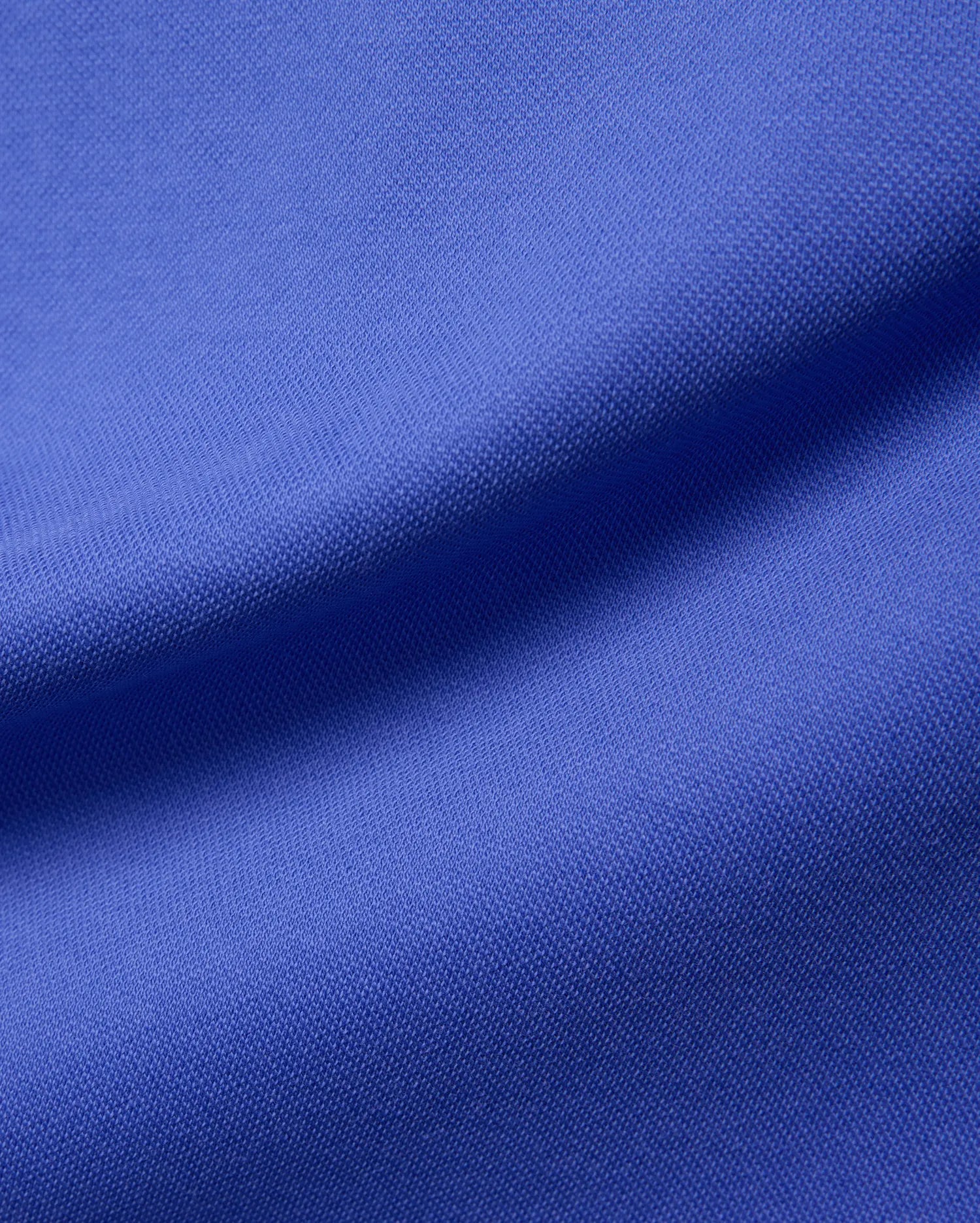 Women's Clara Pique Dress in a rich, vibrant royal blue, showcasing the signature textured pique fabric, embodying Psycho Bunny's premium streetwear aesthetic.