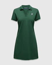 Women's Clara Pique Dress, a dark green polo dress with a classic fit, pique knit texture, and a small embroidered white and pink Psycho Bunny skull logo on the left chest. (5)