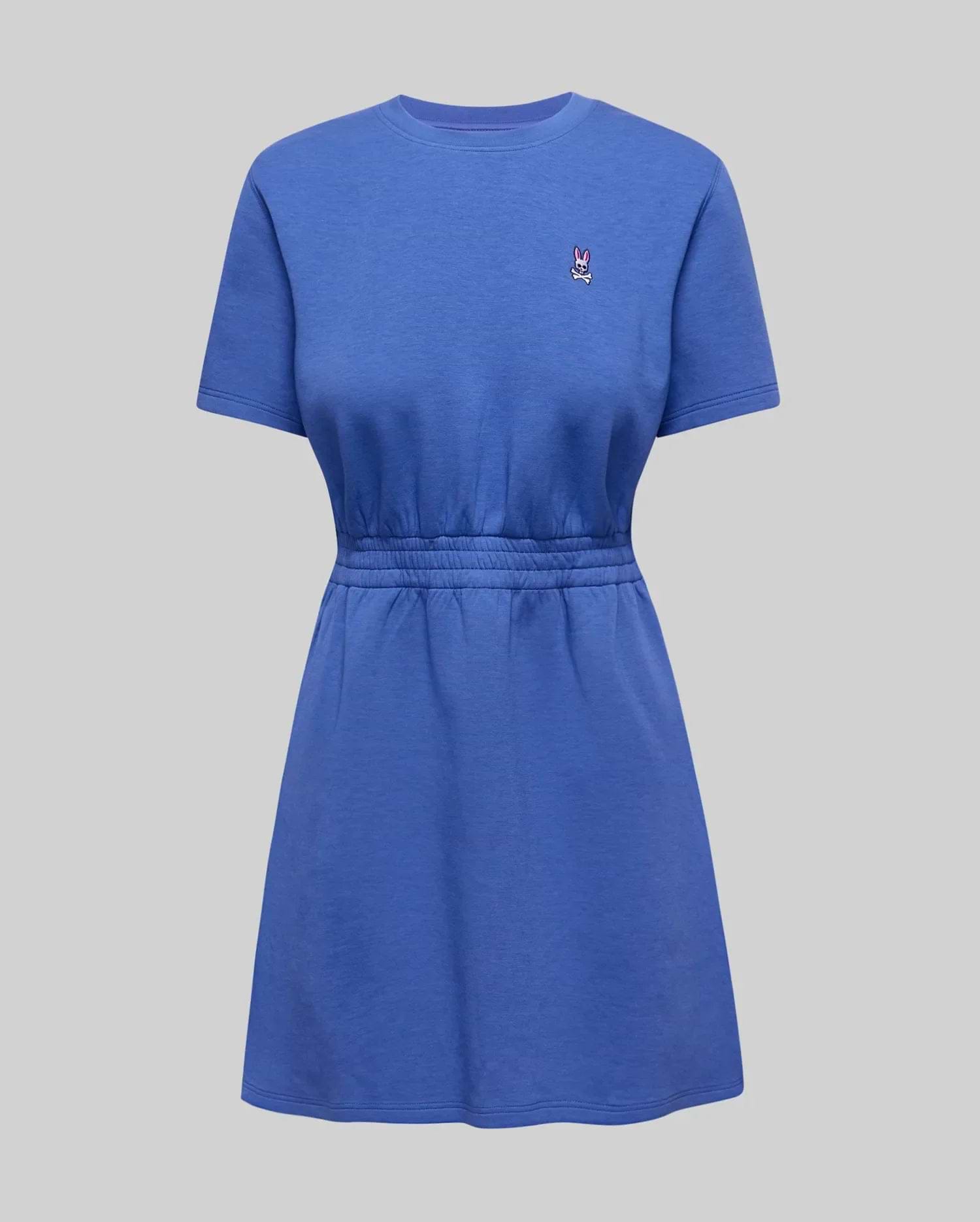 Womens Penelope Dress in blue soft jersey, featuring a relaxed fit, short sleeves, cinched elasticated waist, A-line skirt, and a small embroidered Psycho Bunny skull logo on the left chest. (4)
