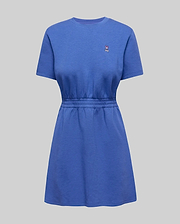 Womens Penelope Dress in blue soft jersey, featuring a relaxed fit, short sleeves, cinched elasticated waist, A-line skirt, and a small embroidered Psycho Bunny skull logo on the left chest. (4)