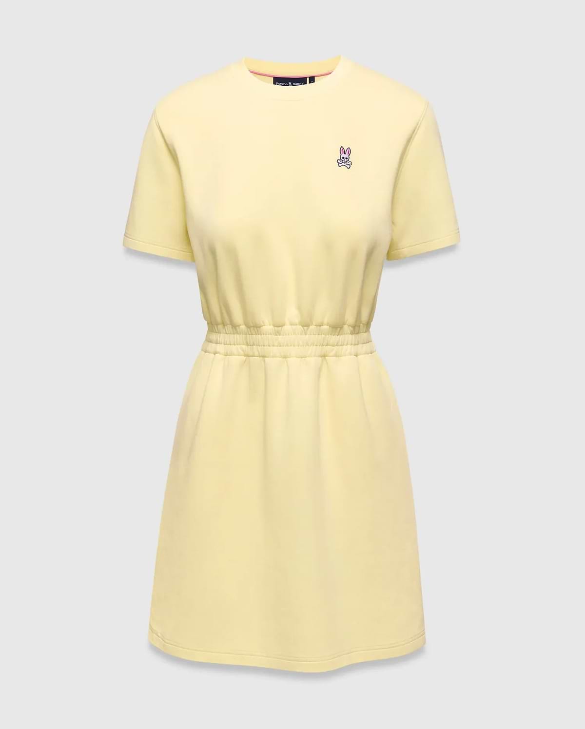 Womens Penelope Dress, a light yellow jersey knit dress with a relaxed fit, crew neck, short sleeves, and an elasticated waist. Features a small pink and white embroidered Psycho Bunny skull logo on the left chest. (4)