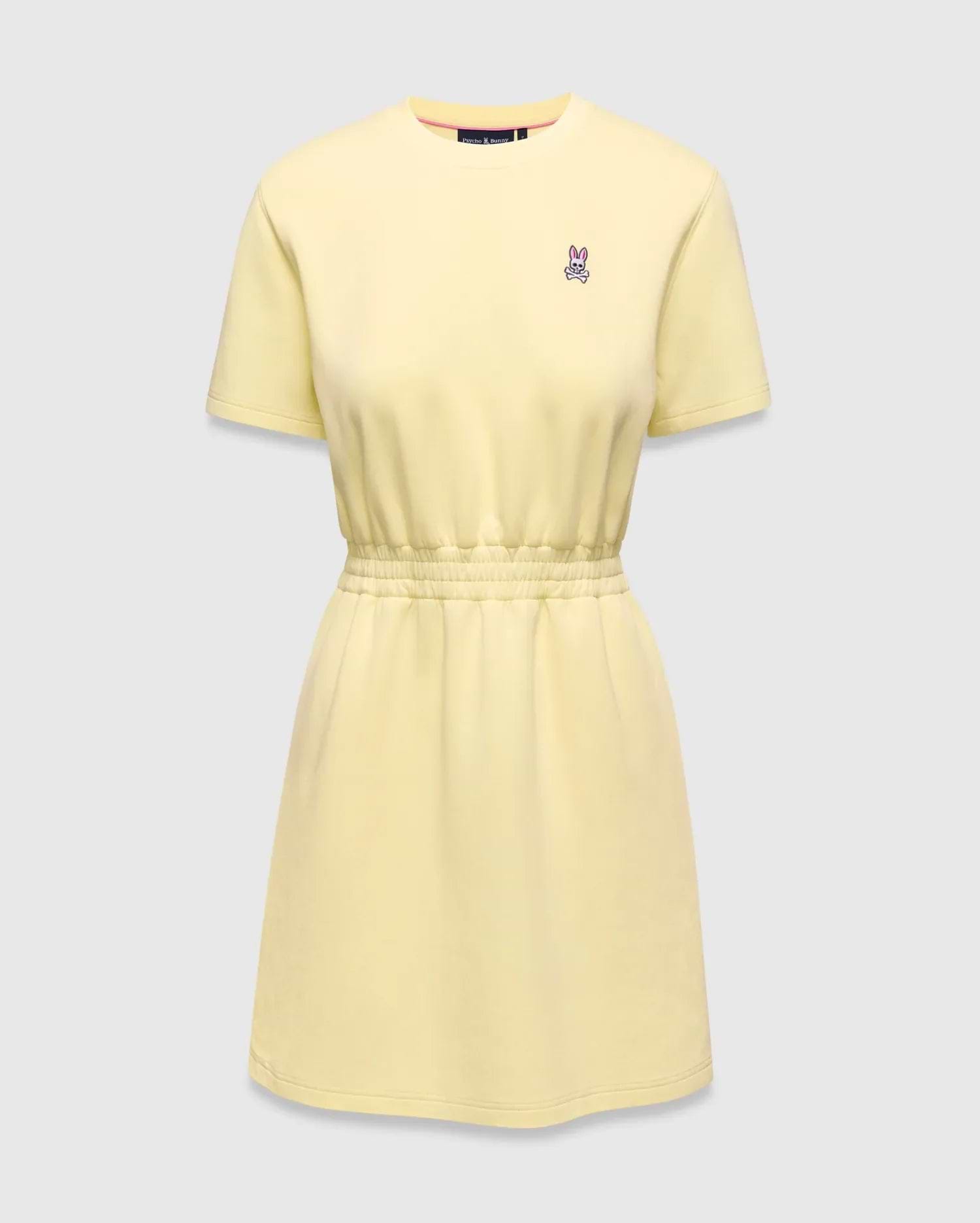 Womens Penelope Dress, a light yellow jersey knit dress with a relaxed fit, crew neck, short sleeves, and an elasticated waist. Features a small pink and white embroidered Psycho Bunny skull logo on the left chest. (4)