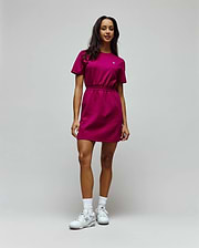 Womens Penelope Dress, a vibrant magenta jersey mini dress with a relaxed fit, crew neck, short sleeves, and an elasticated waist, featuring a small white embroidered Psycho Bunny skull logo on the left chest. (2)