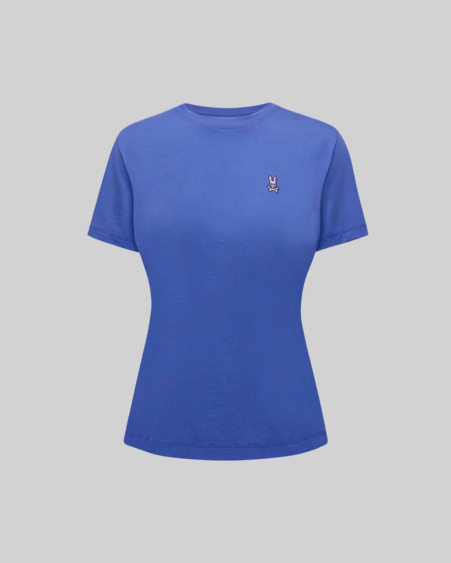 Women's Classic Tee in royal blue, featuring a classic fit and smooth jersey knit fabric. Small embroidered pink and white Psycho Bunny skull logo on the left chest. (5)