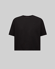 Women's Camille Oversized Fit Tee in black jersey, featuring a small, tone-on-tone embroidered Psycho Bunny skull logo on the left chest and a subtle pink inner collar stripe.