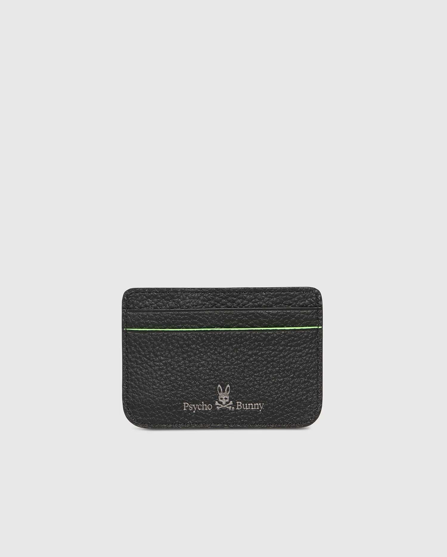 The CARD CASE - B6A409B200 by Psycho Bunny boasts a textured black leather design with a subtle green stripe near the top. Embossed at the bottom are the silver Psycho Bunny logo and name, set against a plain, light gray background for added elegance.