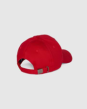 The Psycho Bunny MENS CLASSIC BASEBALL CAP - B6A816A1HT is red with a curved brim, made of six-panel cotton twill, adjustable via a metal buckle strap, and showcases an embroidered Bunny logo. It's shown from the back against a plain gray backdrop.