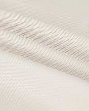 A close-up shows the Psycho Bunny MENS CLASSIC PIQUE POLO SHIRT - B6K001B200, with a textured weave pattern. The soft white fabric resembles fine Pima cotton, with subtle shadowing in the folds that exude timeless men's fashion.