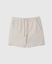 A pair of beige Men's Willis Stretch TENCEL™ shorts from Psycho Bunny, featuring an elastic waistband with a drawstring, two front pockets, and a small embroidered logo on the lower left. The lightweight fabric makes them ideal for casual wear.