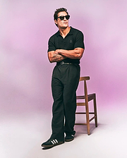 Black Mens Devon Knit Polo, classic fit, featuring a textured knit fabric and a small, tonal embroidered Psycho Bunny skull logo on the left chest.