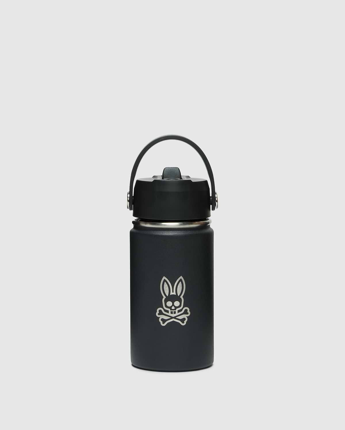 The KIDS PSYCHO BUNNY WATER BOTTLE - B0A375E200 by Psycho Bunny is a black, stainless steel, leak-resistant insulated bottle with a handle on top and features a unique skull with rabbit ears logo on the front against a plain white background.