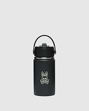 The KIDS PSYCHO BUNNY WATER BOTTLE - B0A375E200 by Psycho Bunny is a black, stainless steel, leak-resistant insulated bottle with a handle on top and features a unique skull with rabbit ears logo on the front against a plain white background.