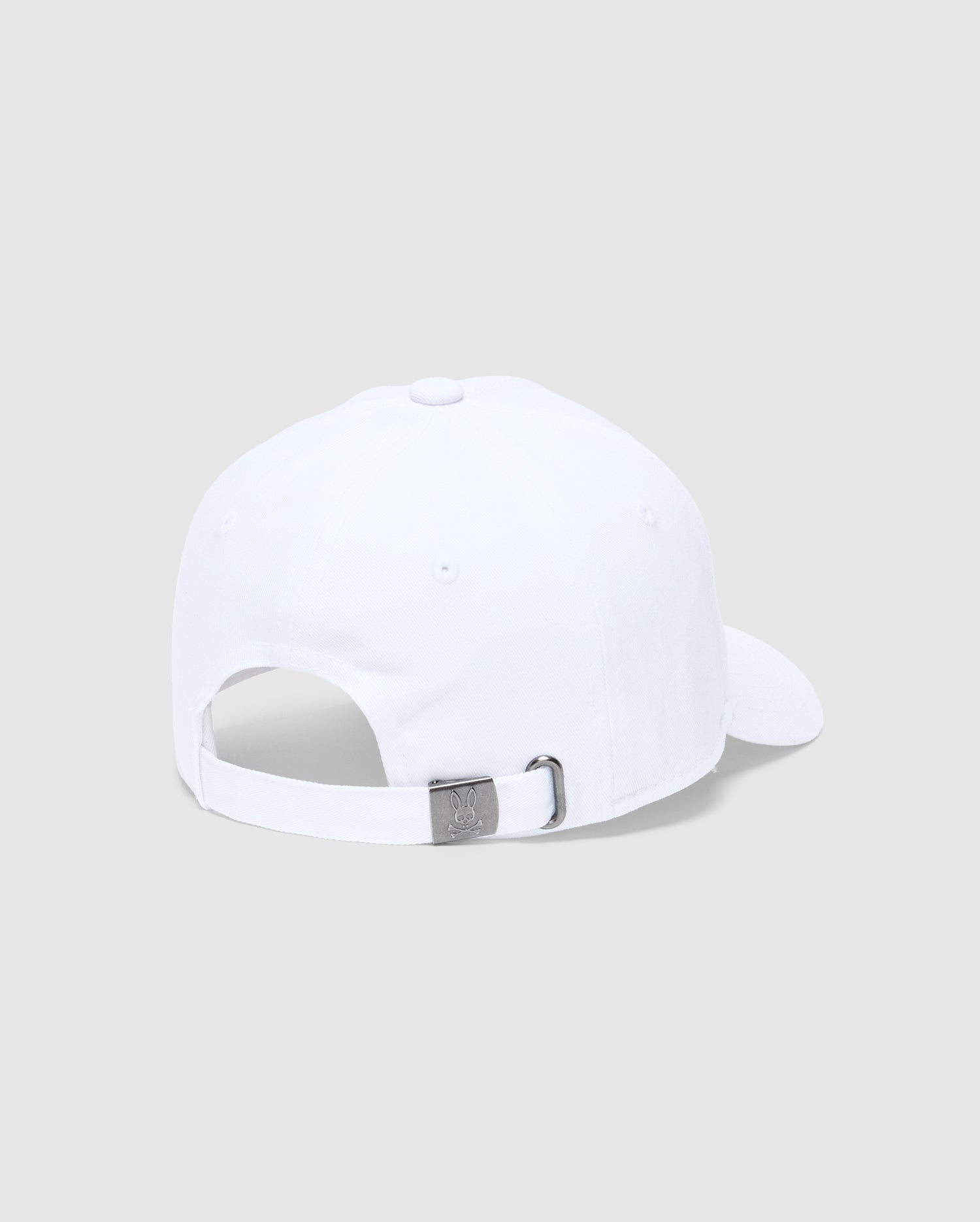 The KIDS CLASSIC BASEBALL CAP - B0A816A1HT by Psycho Bunny features an adjustable metal buckle strap with an embroidered Bunny logo against a light gray background, and a button-topped back panel enhances its timeless design.