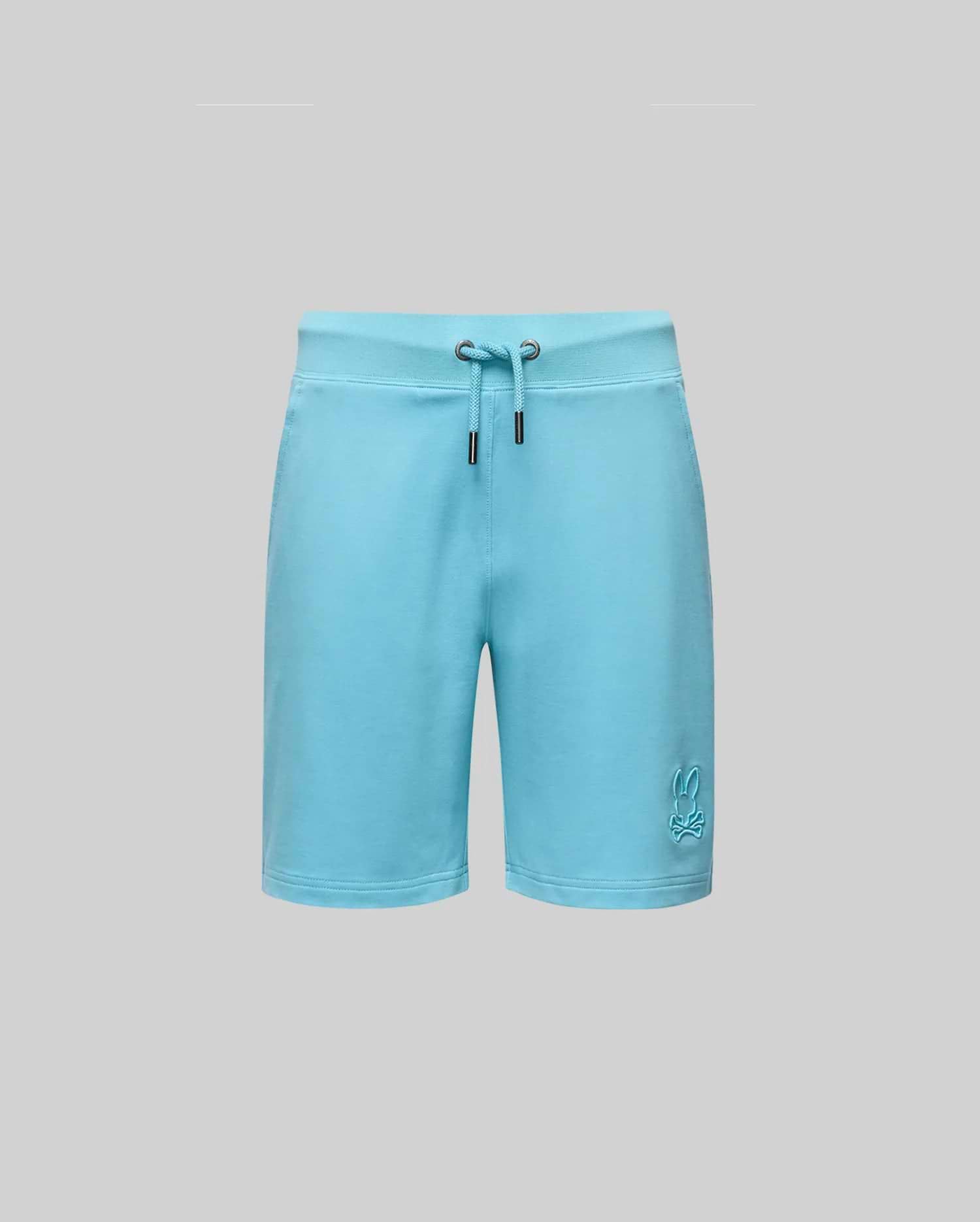 The Psycho Bunny KIDS LEVANZO EMBROIDERED MICRO FRENCH TERRY SWEATSHORT (B0R578F200) in light blue, shown on a plain gray background, features soft micro French Terry fabric and an embroidered bunny logo on the lower left leg.