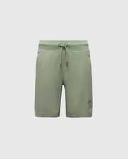 The KIDS LEVANZO FRENCH TERRY SWEATSHORT by Psycho Bunny features a drawstring waist and a small embroidered design on the lower left. Made from stretch cotton jersey, these green shorts offer soft comfort perfect for casual wear against a plain white background.