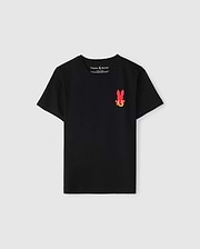The KIDS HAWAII CITY TEE - B0U169Y1PC by Psycho Bunny is a black tee made from soft Pima cotton, featuring a small red and yellow stylized bunny face graphic with folded ears on the left chest, set against a light gray background.