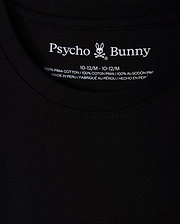 Close-up of the collar on the KIDS NEW YORK CITY TEE - B0U554W1PC in black, featuring the Psycho Bunny logo and text printed inside. This tee is crafted from 100% Pima cotton, ensuring exceptional softness and quality, and is proudly made in Peru.
