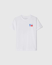 The KIDS TEXAS CITY TEE by Psycho Bunny, model B0U553B2PC, is a white tee made from soft Peruvian Pima cotton. It features a vibrant blue bunny graphic and "TEXAS" in blue and red on the left chest, with short sleeves and a round neckline, ideal for Texas city style fans.