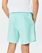 Kids Samos Hydrochromic Printed Swim Trunk in light green, featuring a relaxed fit, elastic waistband, side pockets, and a back pocket, made from smooth quick-dry fabric.