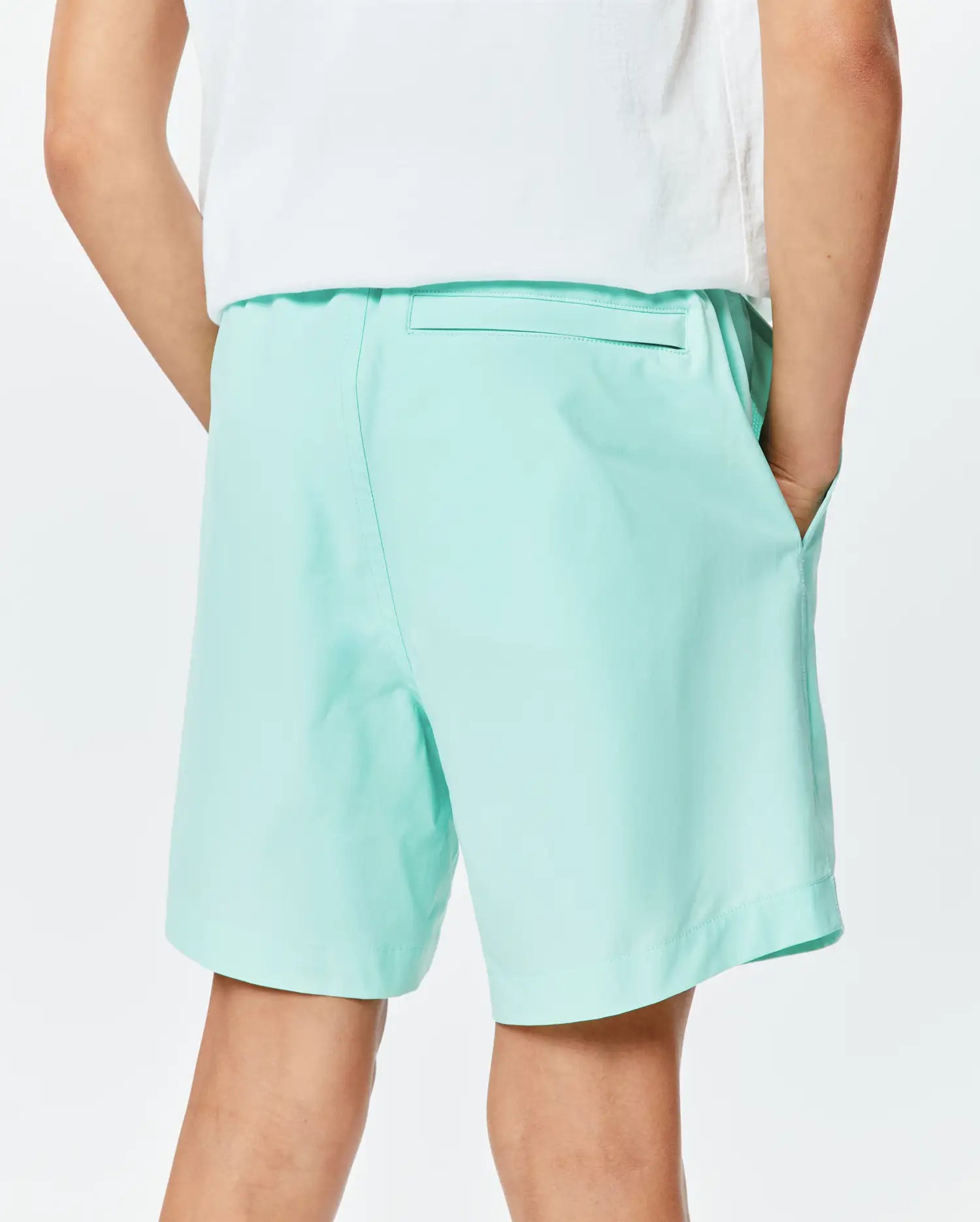 Kids Samos Hydrochromic Printed Swim Trunk in light green, featuring a relaxed fit, elastic waistband, side pockets, and a back pocket, made from smooth quick-dry fabric.