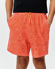 Coral orange Kids Samos Hydrochromic Printed Swim Trunk, relaxed fit, quick-dry, all-over tonal bunny skull and crossbones pattern, orange drawstring, small pink embroidered bunny skull on lower left leg.