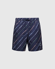The Psycho Bunny KIDS RENMARK PB PRINTED SWIM TRUNK - B0W622F200 are navy blue polyester stretch shorts with a drawstring waistband. They feature colorful diagonal stripes and the words "retro blend" in white, green, blue, and red, along with an embroidered logo on the lower left leg.