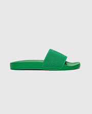 Mens Knit Slides in a vibrant green, featuring a textured knit strap with a subtly embossed Psycho Bunny skull logo, offering a bold streetwear aesthetic.