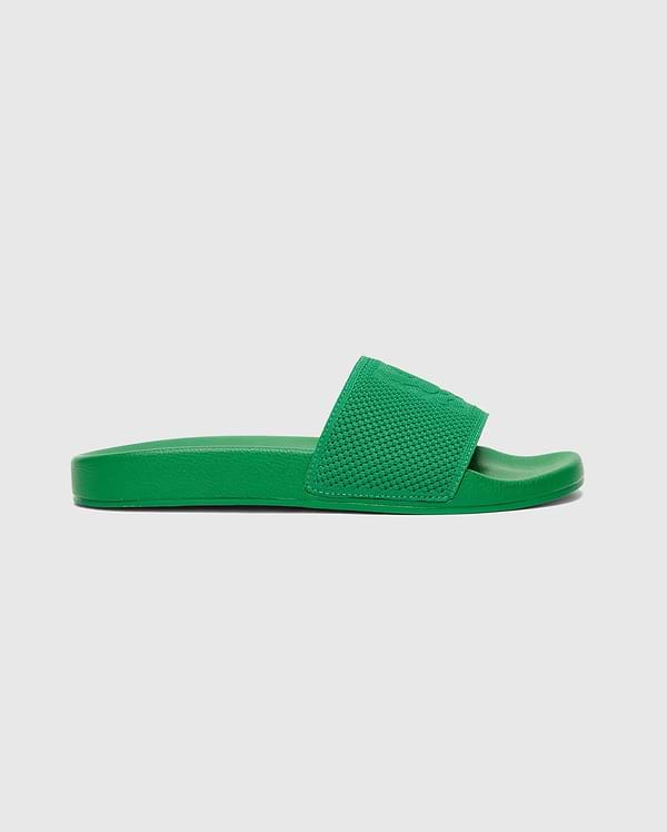 Mens Knit Slides in a vibrant green, featuring a textured knit strap with a subtly embossed Psycho Bunny skull logo, offering a bold streetwear aesthetic.