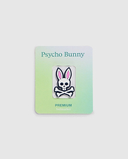 Explore the Psycho Bunny golfers collection with this premium ball marker featuring a white skull with pink bunny ears. Attached to a gradient card transitioning from light green to light blue, it showcases "Psycho Bunny" at the top and "PREMIUM BALL MARKER - B6A698C200" at the bottom.