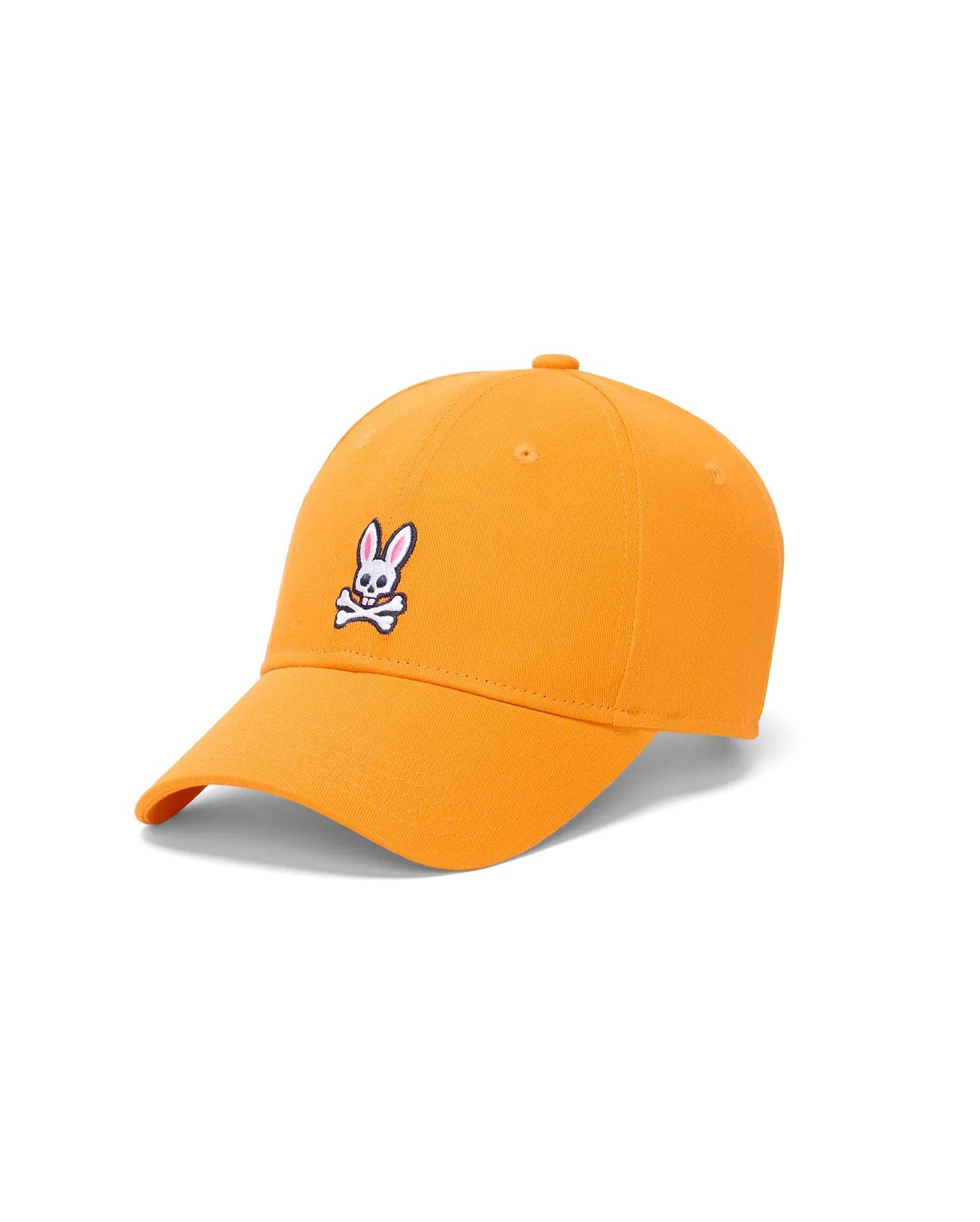 Mens Classic Baseball Cap in vibrant orange cotton twill, featuring a medium-sized embroidered Psycho Bunny skull and crossbones logo in white, black, and red on the front.