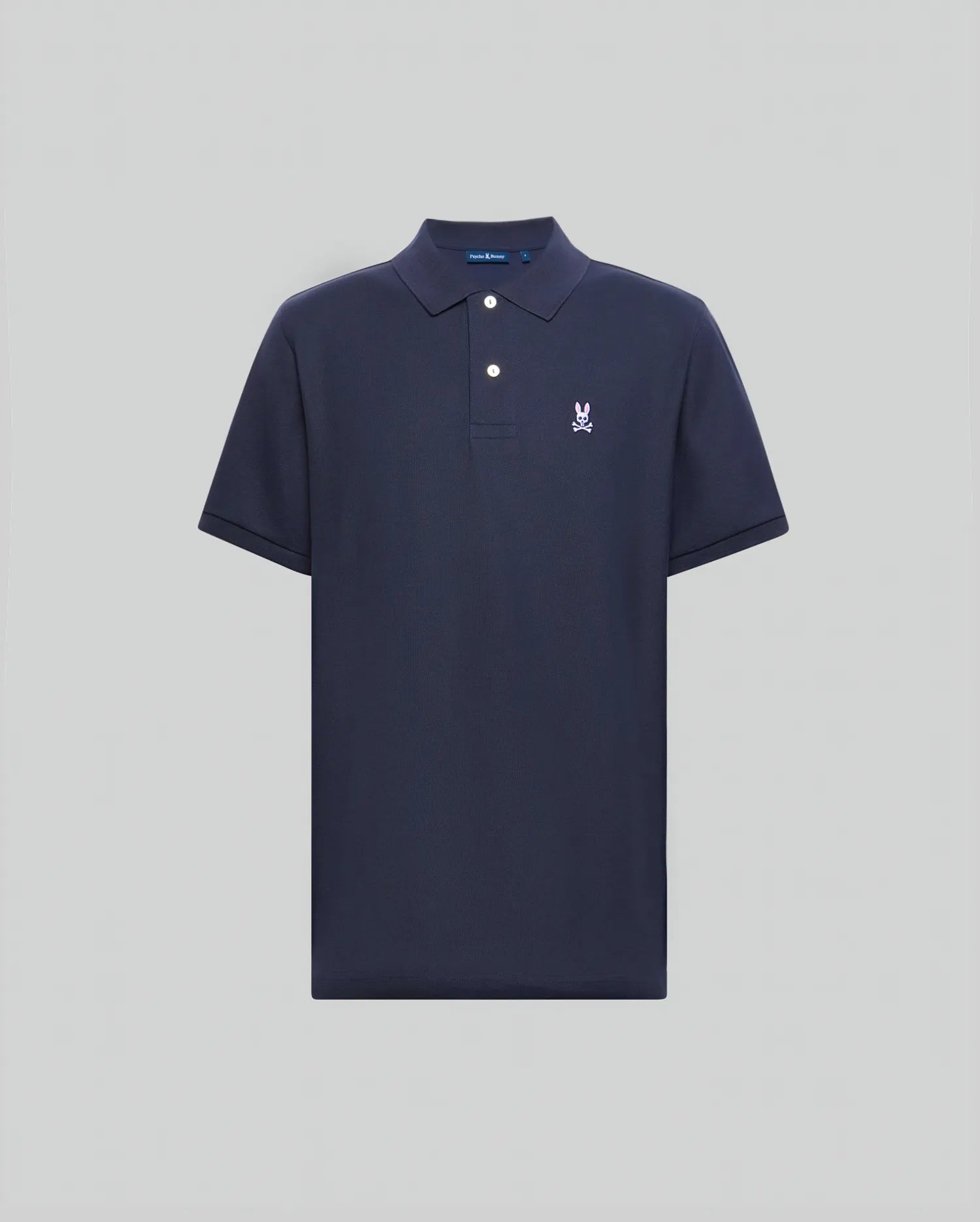 Mens Classic Pique Polo Shirt in navy, featuring a classic fit, two white buttons, and a small pink/purple embroidered Psycho Bunny skull logo on the left chest.