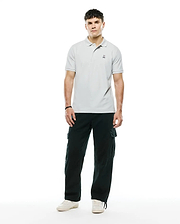 MENS CLASSIC PIQUE POLO in light grey, a classic fit with pique texture and a small black embroidered Psycho Bunny skull logo on the left chest.