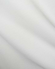 Mens Classic Pique Polo in crisp white, showcasing a distinct pique fabric texture and the iconic small embroidered Psycho Bunny skull logo on the left chest.