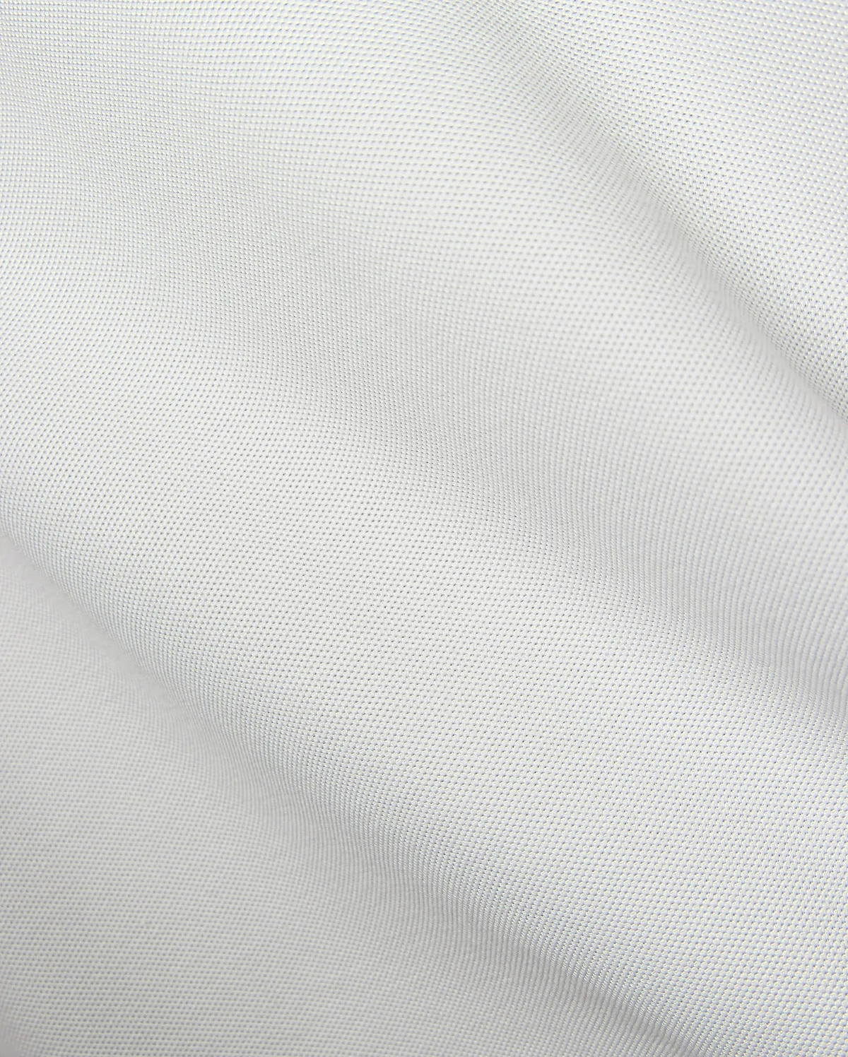 Mens Classic Pique Polo in crisp white, showcasing a distinct pique fabric texture and the iconic small embroidered Psycho Bunny skull logo on the left chest.