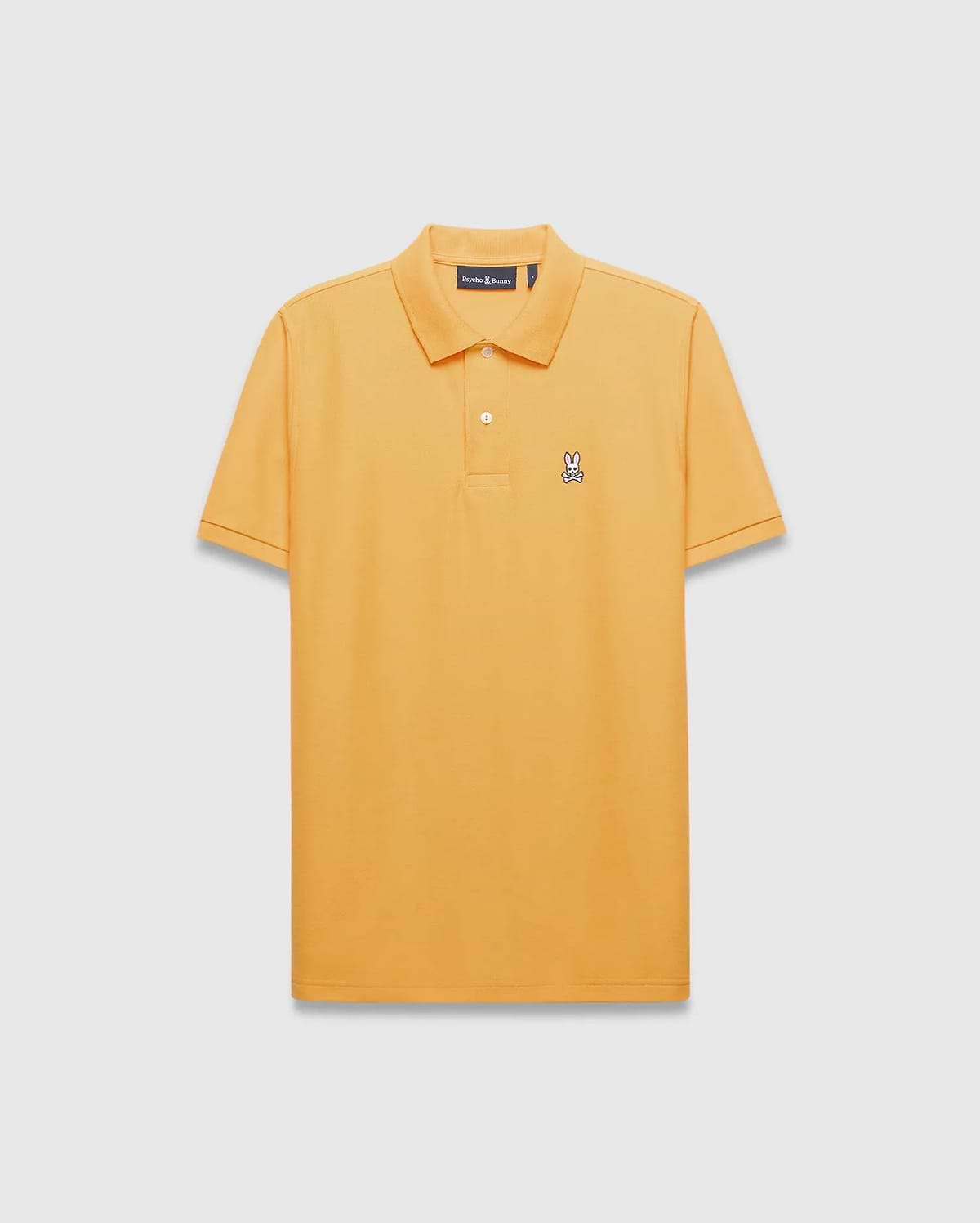 Mens Classic Pique Polo in vibrant marigold orange, with a classic fit, two-button placket, and a small embroidered multi-color Psycho Bunny skull logo on the left chest.