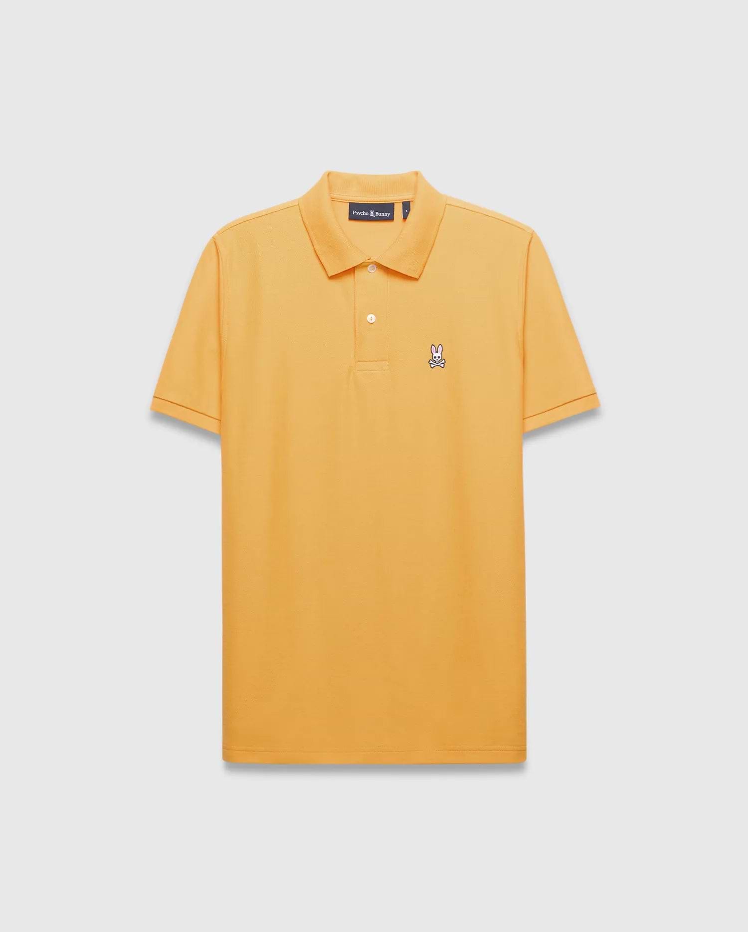 Mens Classic Pique Polo in vibrant marigold orange, with a classic fit, two-button placket, and a small embroidered multi-color Psycho Bunny skull logo on the left chest.