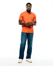 Men's Classic Pima Pique Polo in vibrant orange, featuring a classic fit, visible pique texture, two-button placket, and a small embroidered Psycho Bunny skull logo on the left chest. (4)