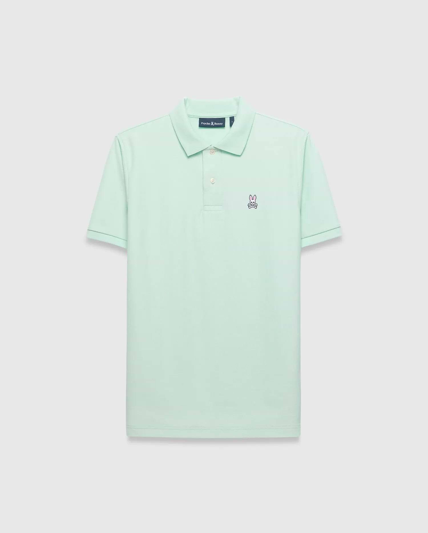 Mens Classic Pique Polo in mint green, featuring a classic fit and pique texture. Small embroidered pink and navy Psycho Bunny skull logo on the left chest with white buttons. (2)