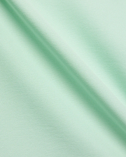 Vibrant Mint Green MENS CLASSIC PIQUE POLO fabric, showcasing its distinctive textured pique knit, soft drape, and premium quality, ideal for refined streetwear. (6)
