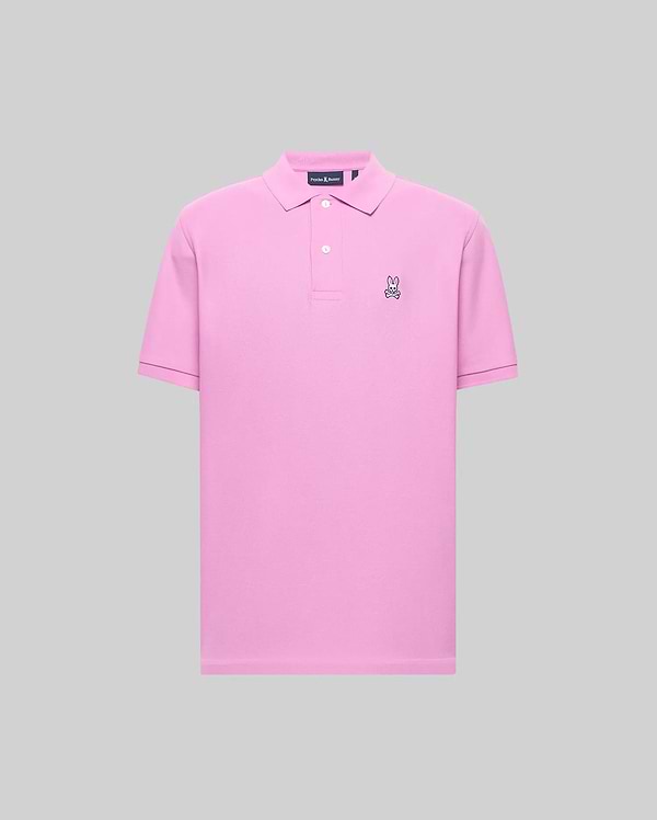 Mens Classic Pique Polo in vibrant pink, featuring a classic fit, pique knit texture, two white buttons, and a small black and white embroidered Psycho Bunny skull logo on the left chest.