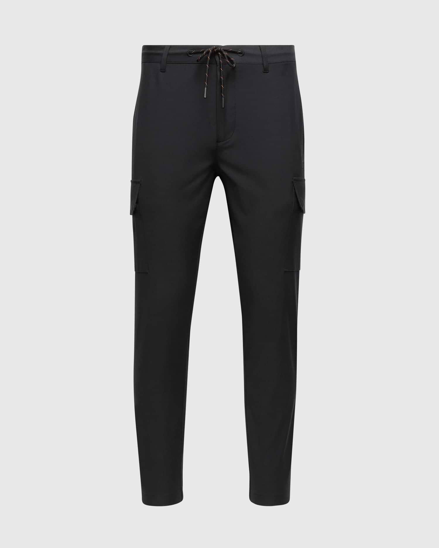 The MENS LLOYD CARGO JOGGER - B6P159B200 by Psycho Bunny are black with a slim fit design, featuring elasticized cuffs and an adjustable drawstring waistband. These joggers have utilitarian pockets on the sides and offer a sleek, modern look. The product is showcased against a white background.