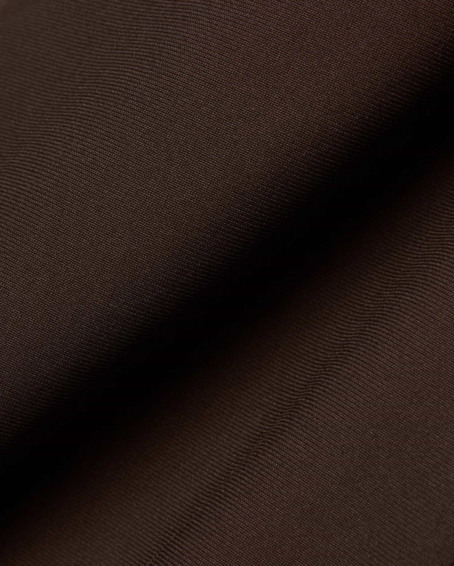 Mens Maverick 10k Step Pant in rich dark brown, featuring a finely woven, subtly textured fabric, reflecting Psycho Bunny's refined streetwear aesthetic.