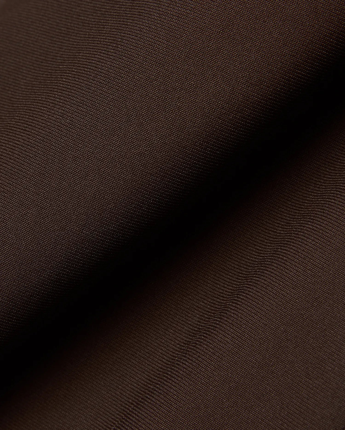 Mens Maverick 10k Step Pant in rich dark brown, featuring a finely woven, subtly textured fabric, reflecting Psycho Bunny's refined streetwear aesthetic.