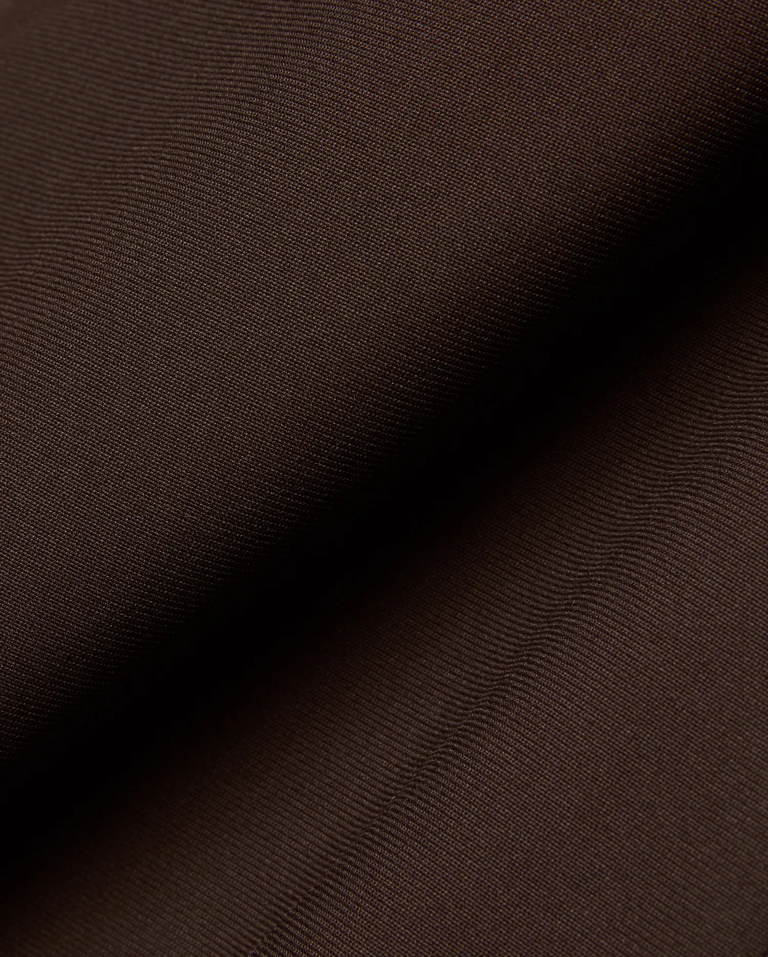 Mens Maverick 10k Step Pant in rich dark brown, featuring a finely woven, subtly textured fabric, reflecting Psycho Bunny's refined streetwear aesthetic.